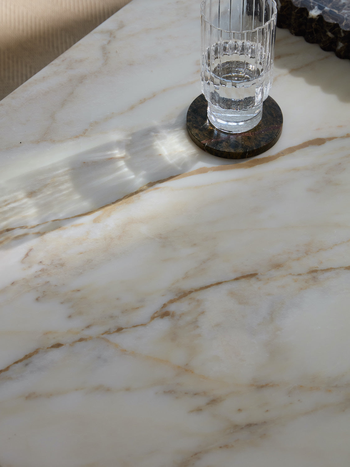 Glass of water on a marble surface