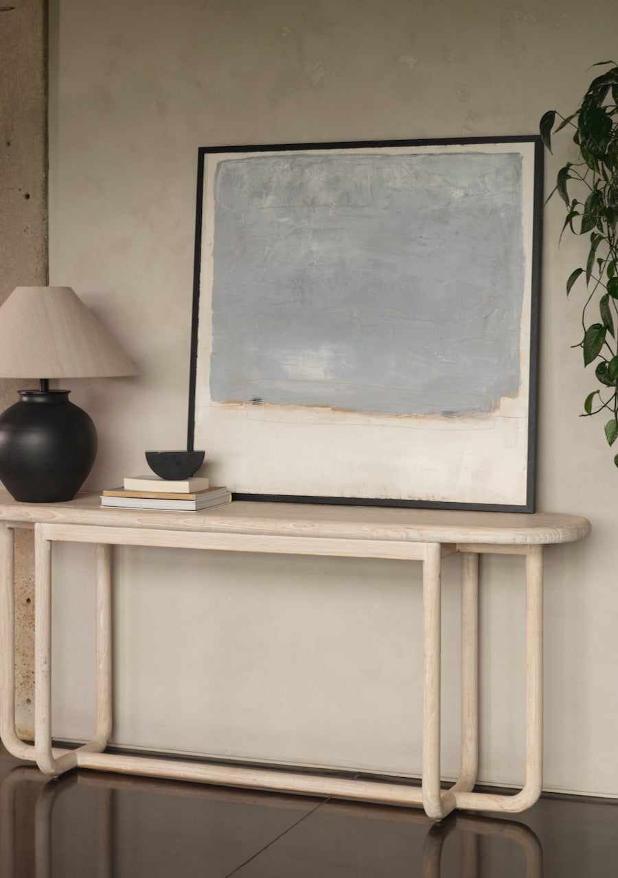 Layered Lounge wall art adding scale and balance above furniture