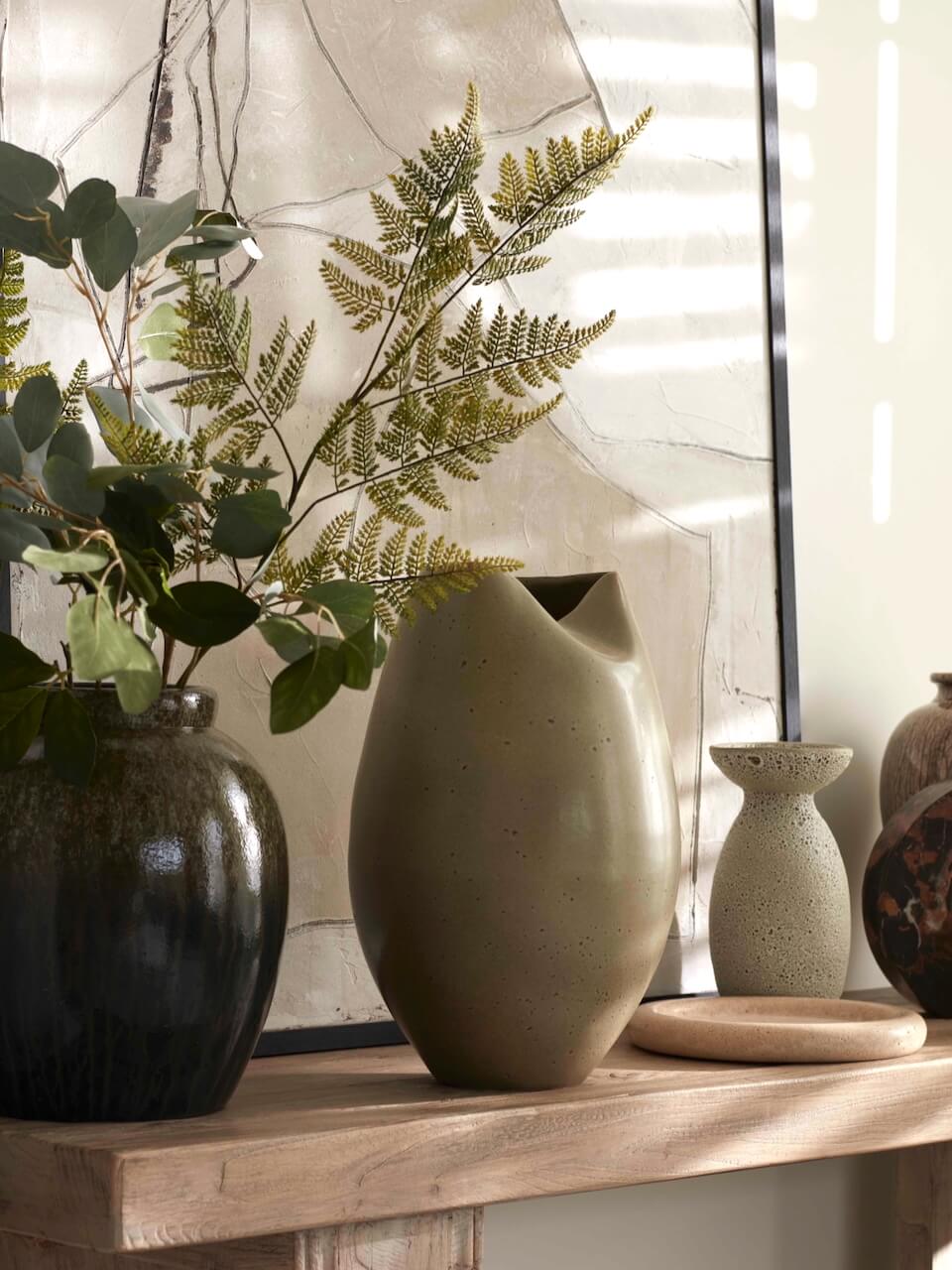 Textured decorative vases in varied heights and shapes