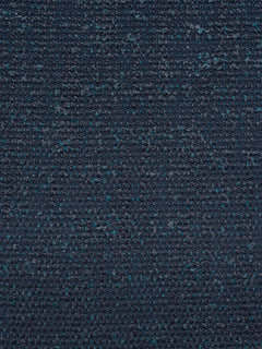 A close-up texture shot of a dark navy blue woven fabric with subtle teal and black flecks throughout.